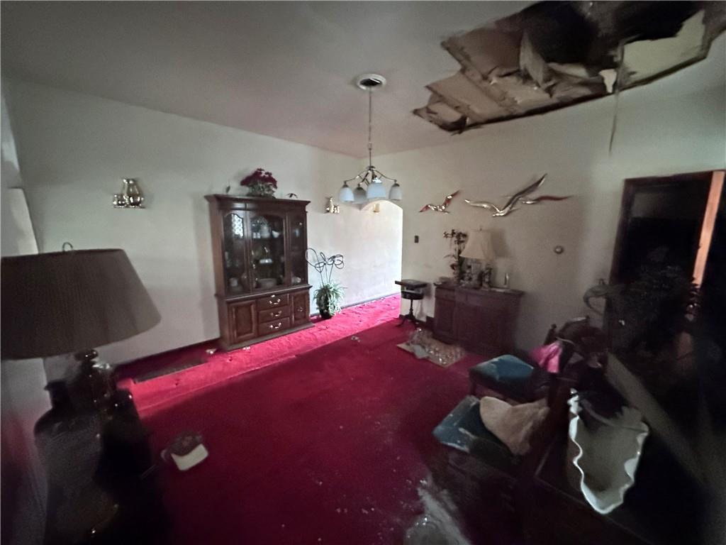 5323 Broad Street Pittsburgh, PA 15224 - Photo 10 of 38 a bed room with a bed and a television