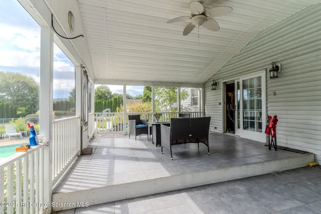 a view of a backyard with a patio