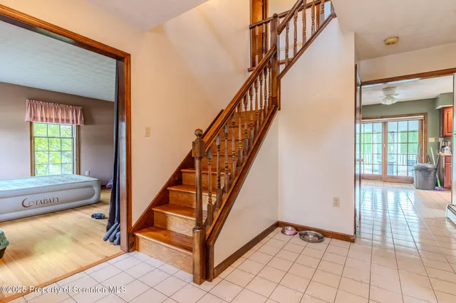 a kitchen with a stove a sink and a microwave