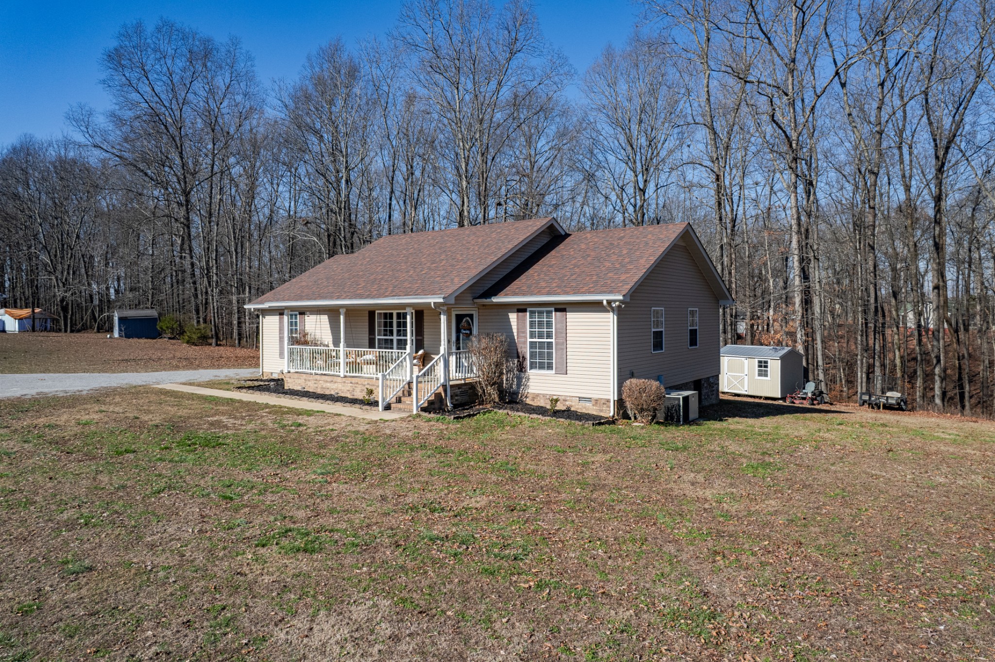 129 Poling Drive Pulaski, TN 38478 - Photo 11 of 67 a front view of a house with a yard