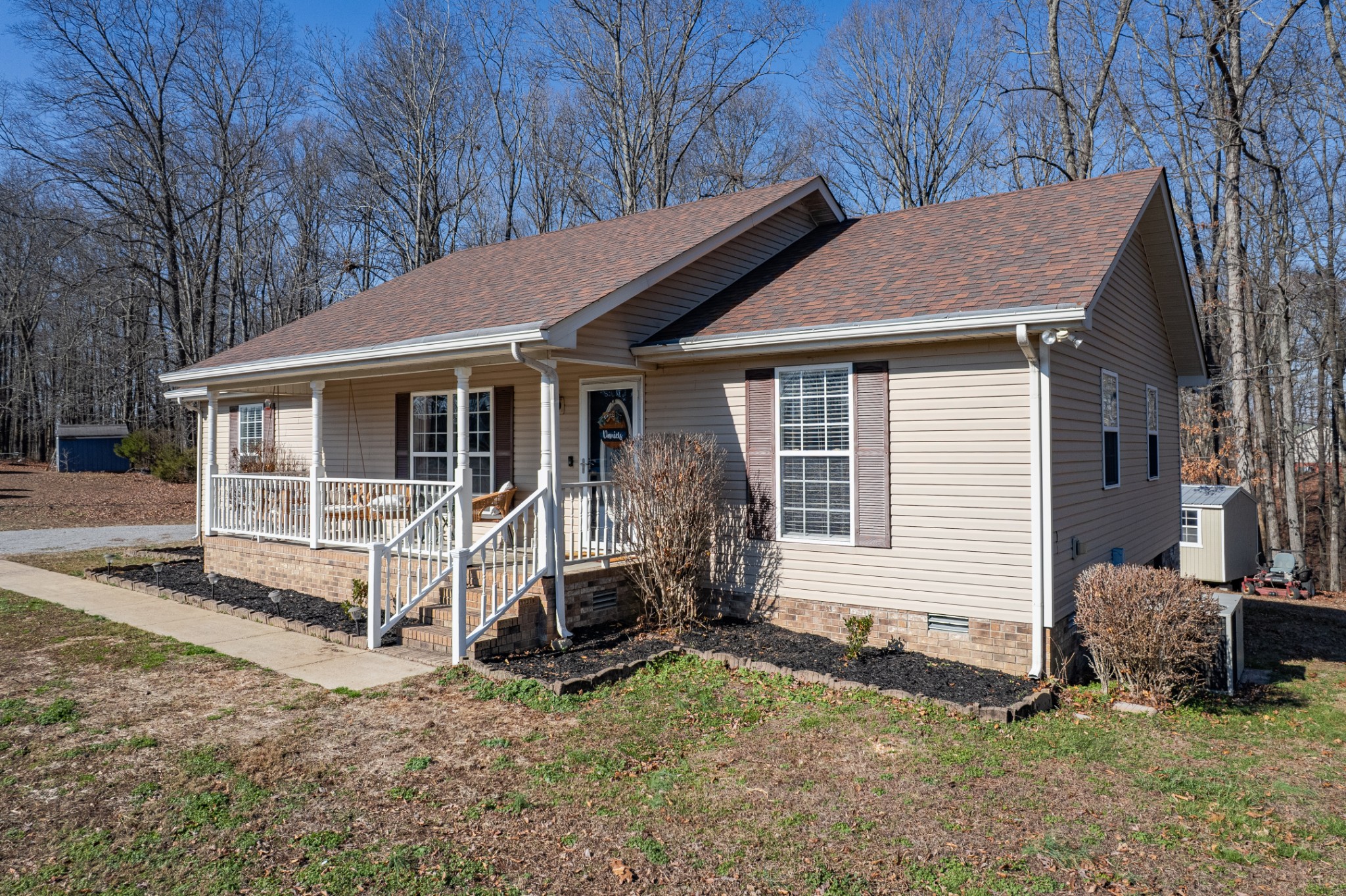 129 Poling Drive Pulaski, TN 38478 - Photo 12 of 67 a view of house with a yard outdoor seating and covered with yard