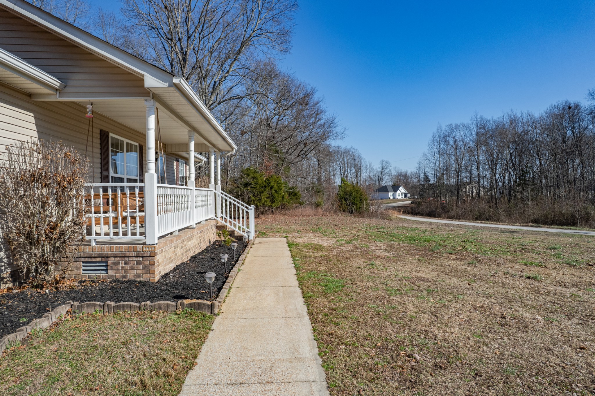 129 Poling Drive Pulaski, TN 38478 - Photo 14 of 67 a view of a yard in front of a house