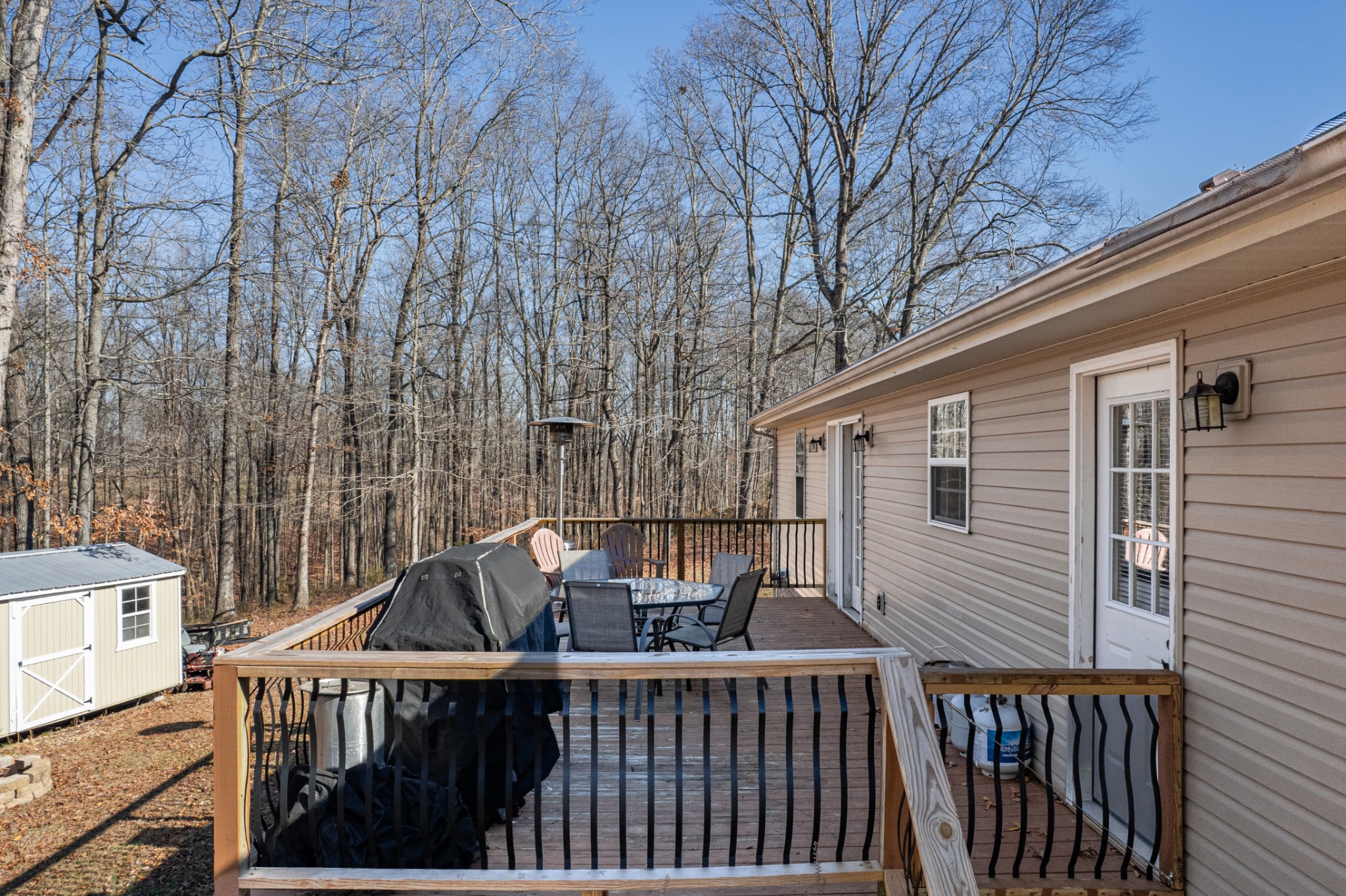 129 Poling Drive Pulaski, TN 38478 - Photo 18 of 67 a view of a roof deck with couches and wooden fence