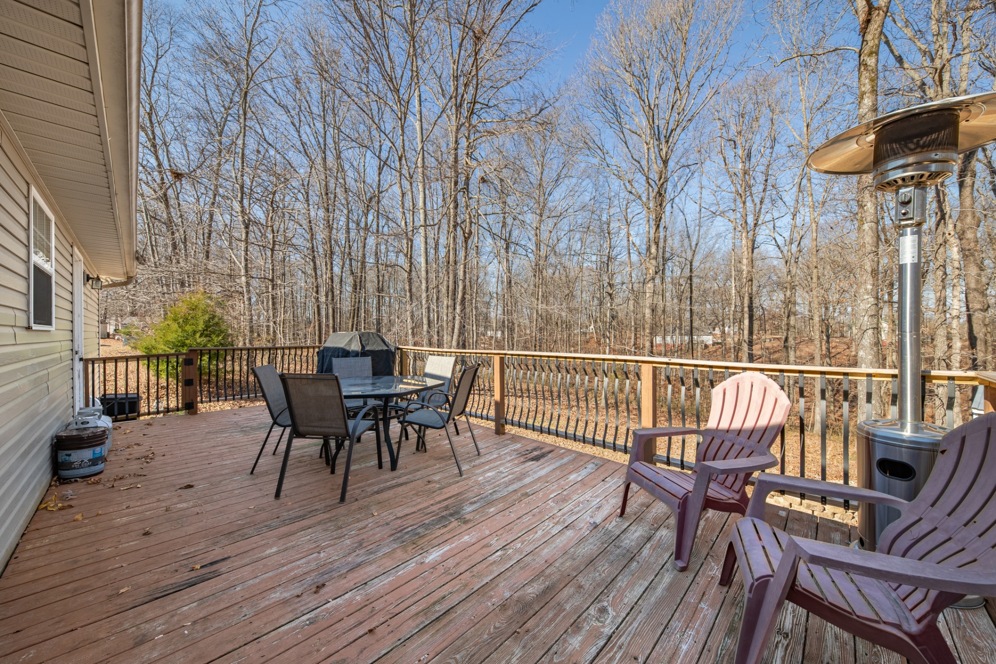 129 Poling Drive Pulaski, TN 38478 - Photo 27 of 67 a view of a roof deck with table and chairs with wooden floor and fence
