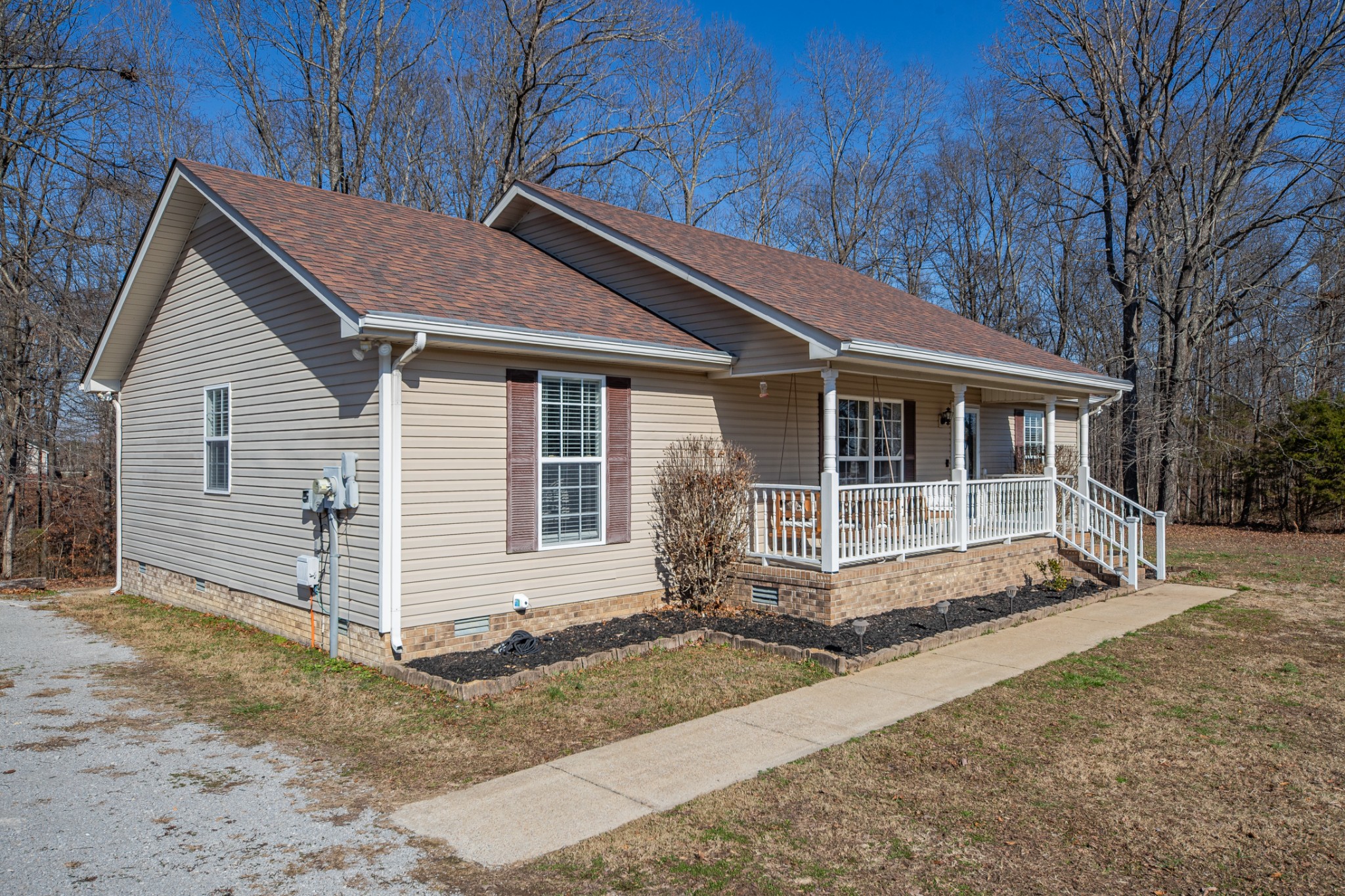 129 Poling Drive Pulaski, TN 38478 - Photo 33 of 67 a front view of a house with a yard