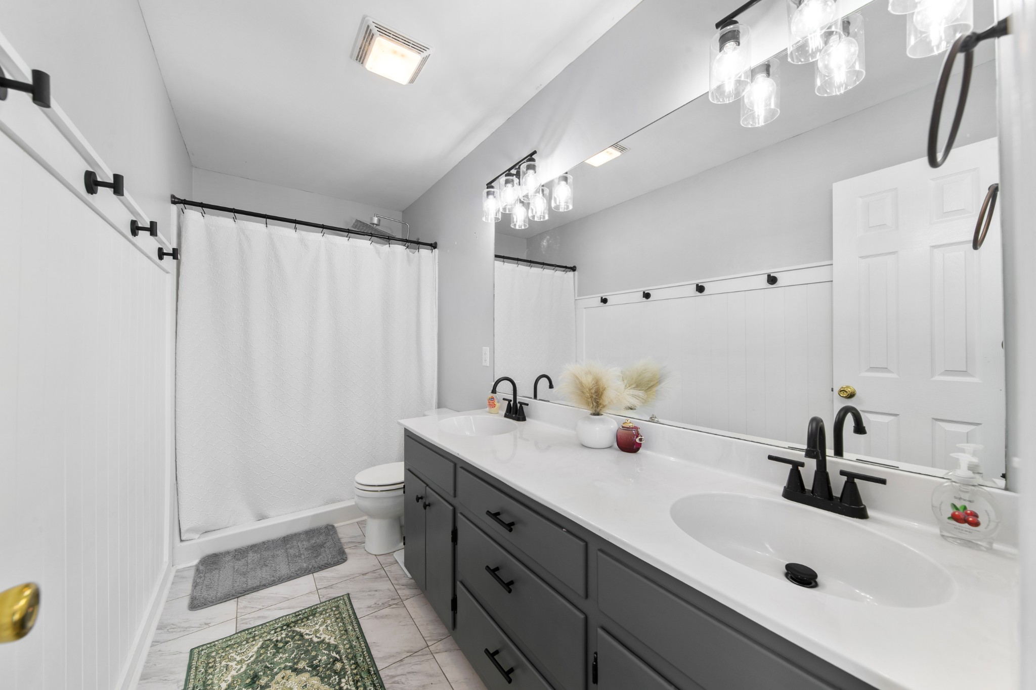129 Poling Drive Pulaski, TN 38478 - Photo 41 of 67 a bathroom with a sink a mirror and shower