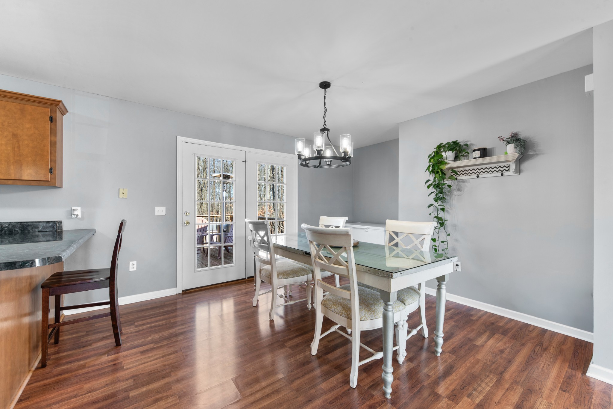 129 Poling Drive Pulaski, TN 38478 - Photo 48 of 67 a view of a dining room with furniture wooden floor and chandelier