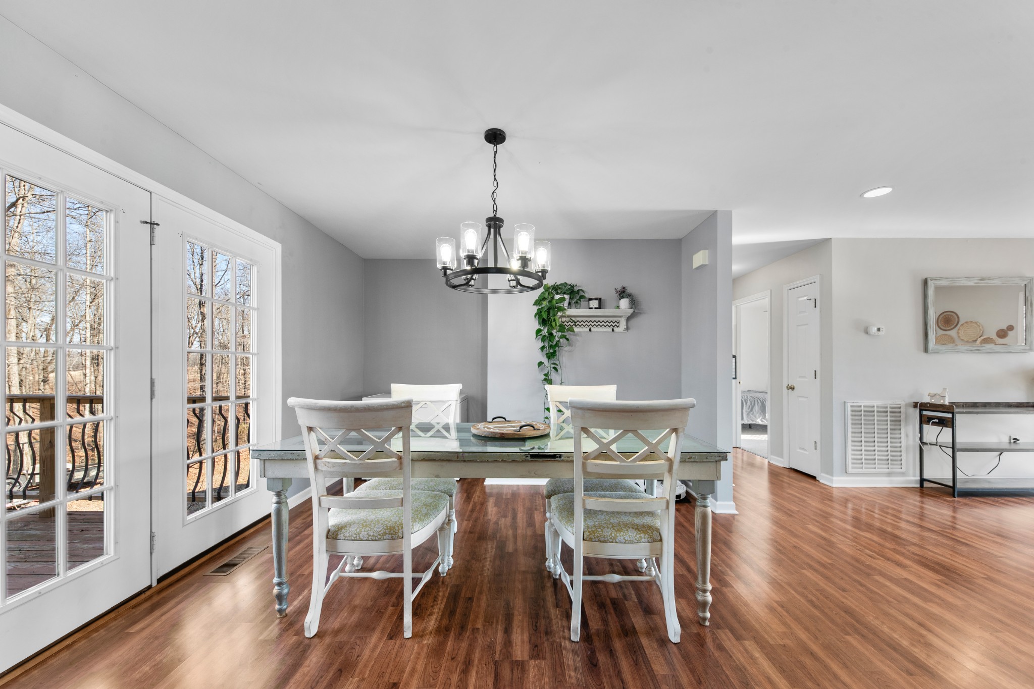 129 Poling Drive Pulaski, TN 38478 - Photo 49 of 67 a view of a dining room with furniture wooden floor and chandelier