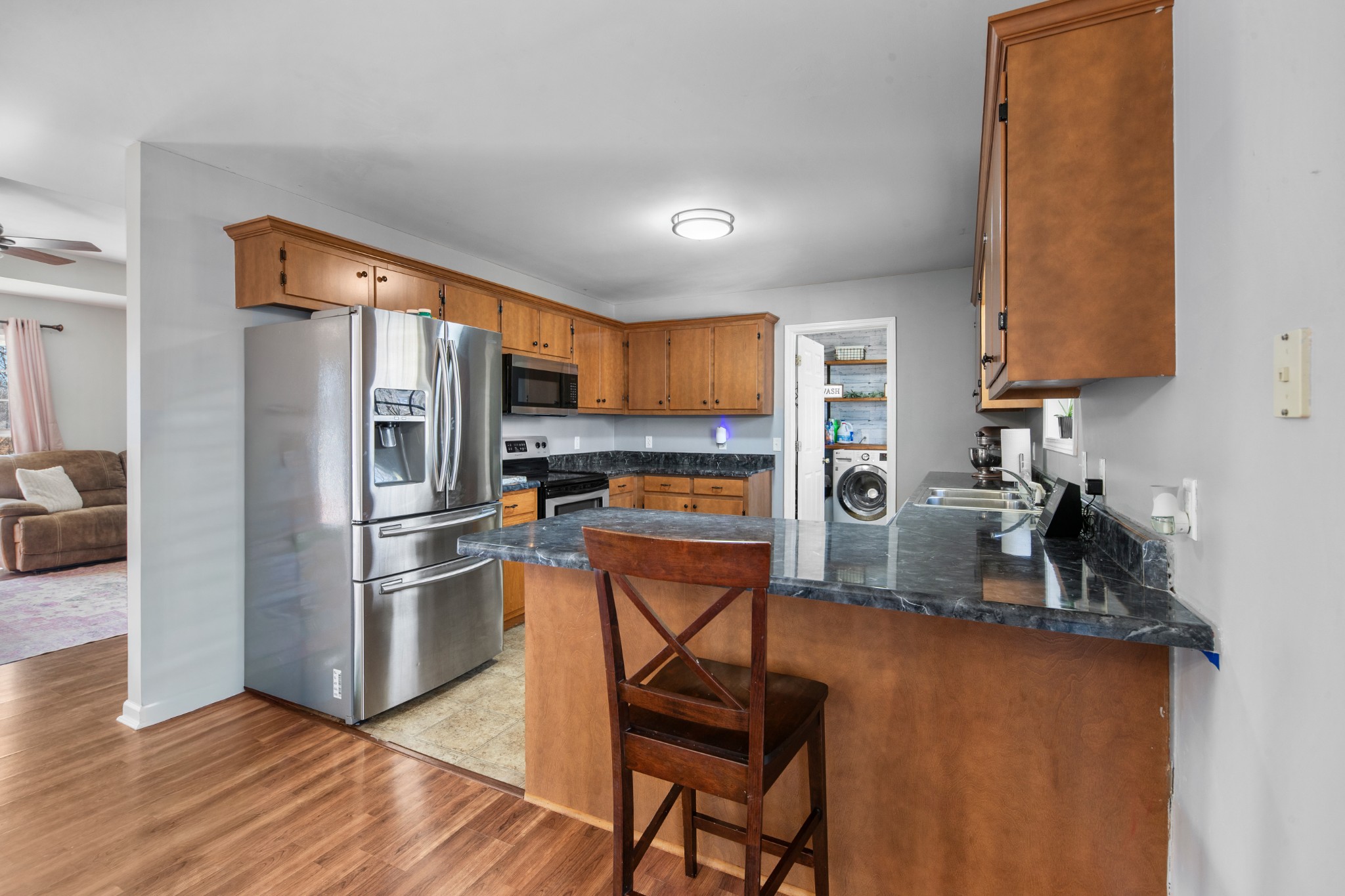 129 Poling Drive Pulaski, TN 38478 - Photo 51 of 67 a kitchen with stainless steel appliances a refrigerator and a stove top oven