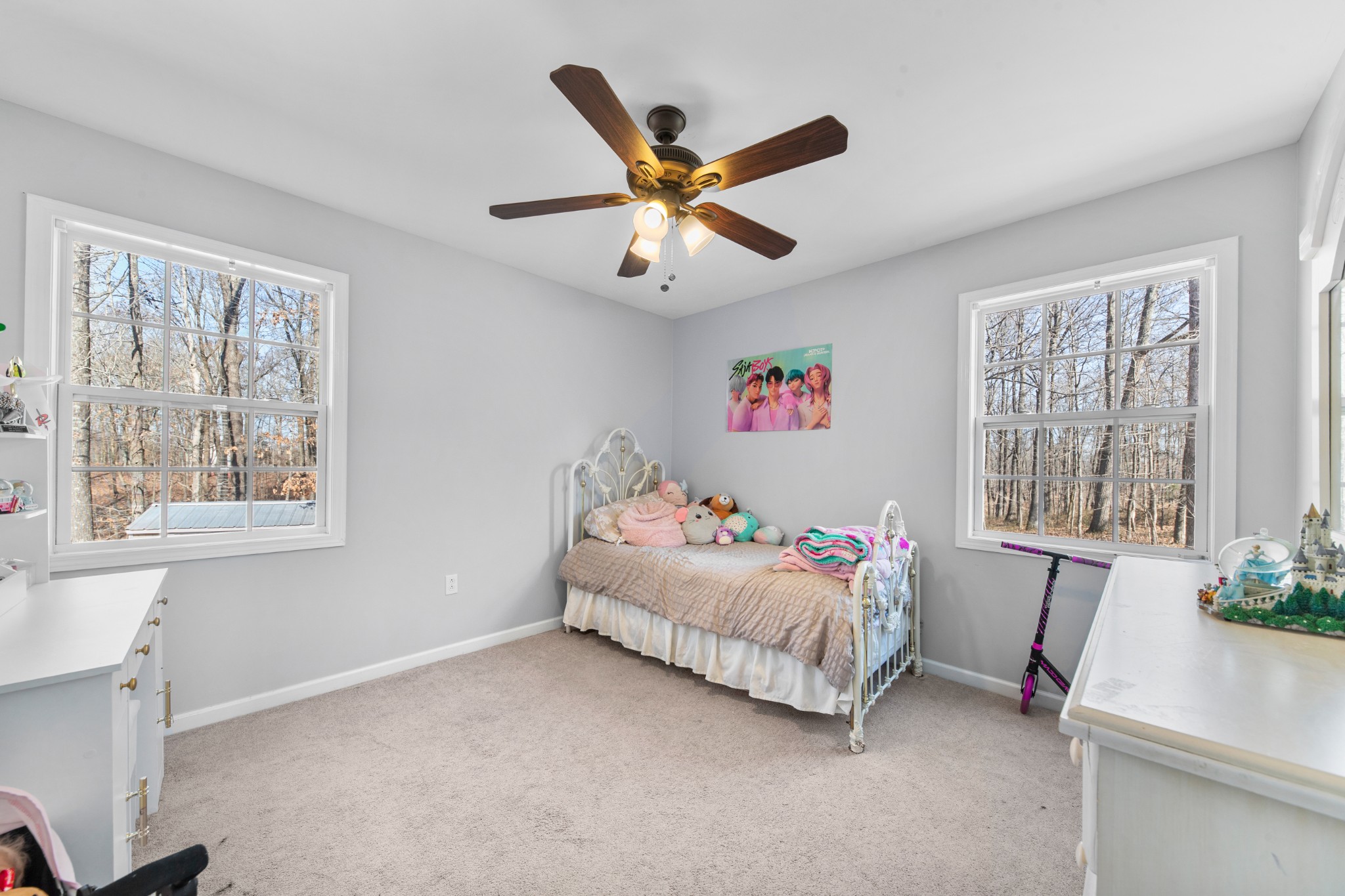 129 Poling Drive Pulaski, TN 38478 - Photo 63 of 67 a bedroom with a bed and a chandelier