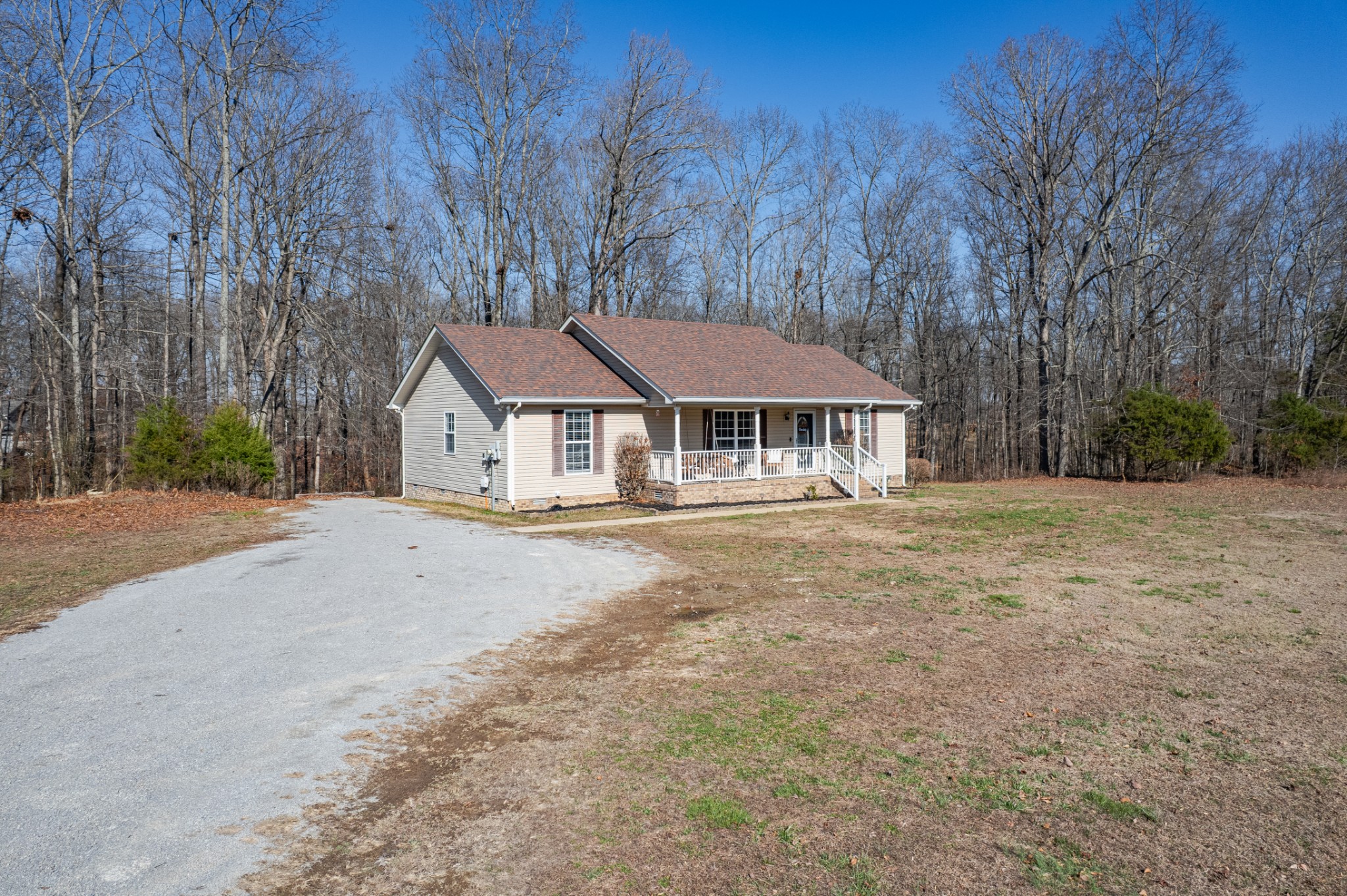 129 Poling Drive Pulaski, TN 38478 - Photo 9 of 67 a front view of a house with a yard