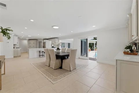 a kitchen with cabinets and stainless steel appliances