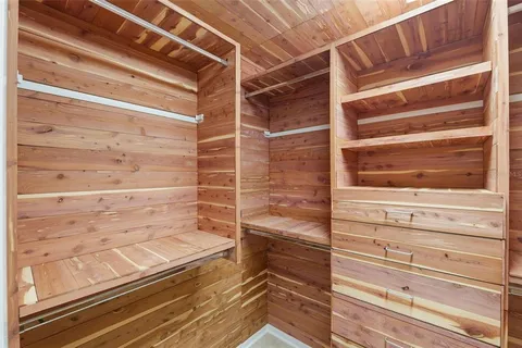 a bathroom with a toilet sink and shower