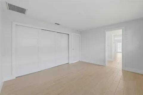 a view of a patio with a table and chairs