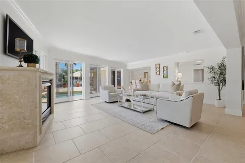 a view of a living room and entryway