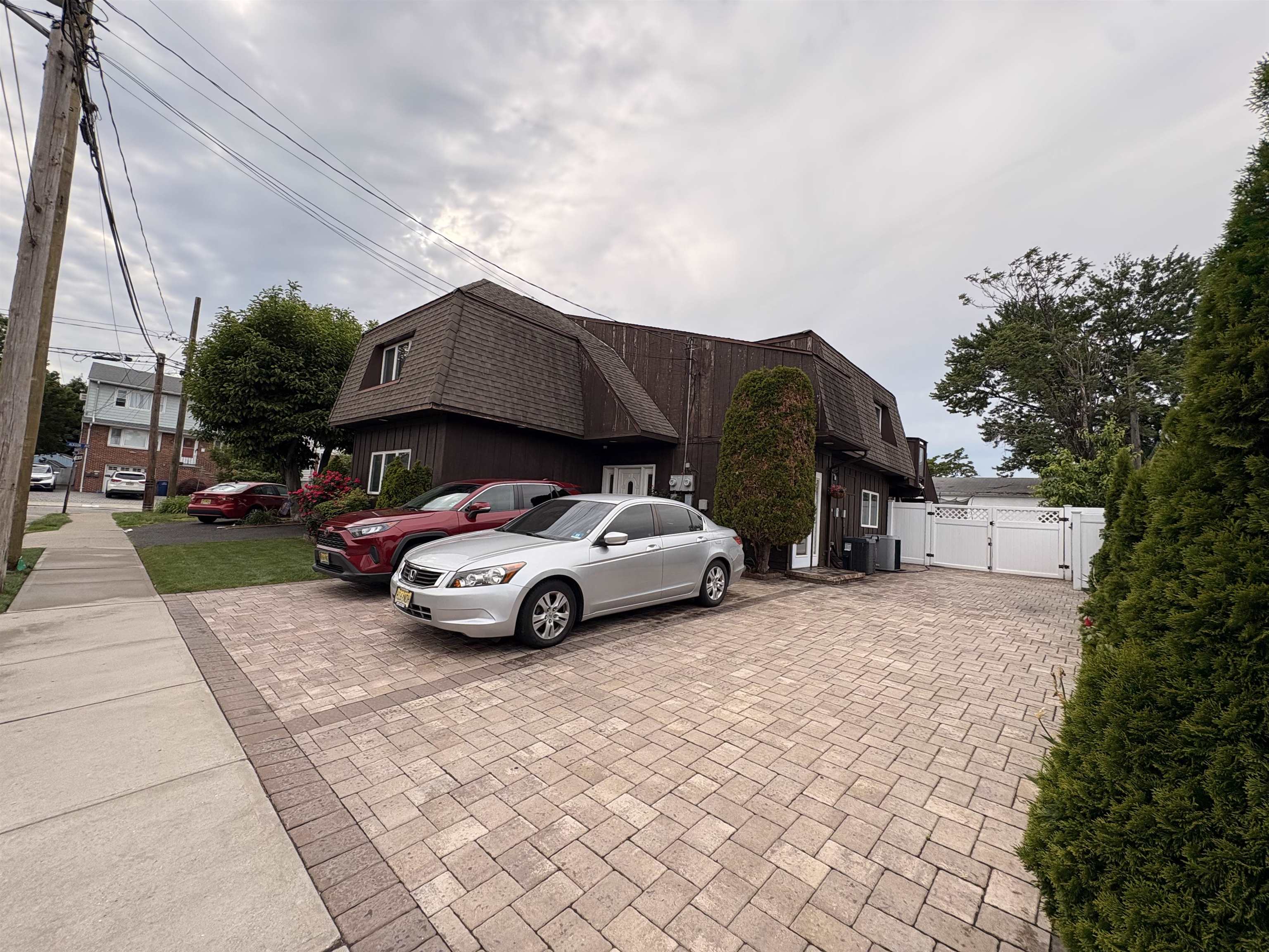 32 Franklin Street, Unit 2 Hackensack, NJ 07601 - Photo 2 of 13 a car parked in front of a house