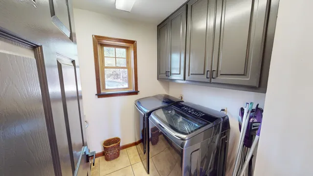 a view of a storage and utility room in a kitchen
