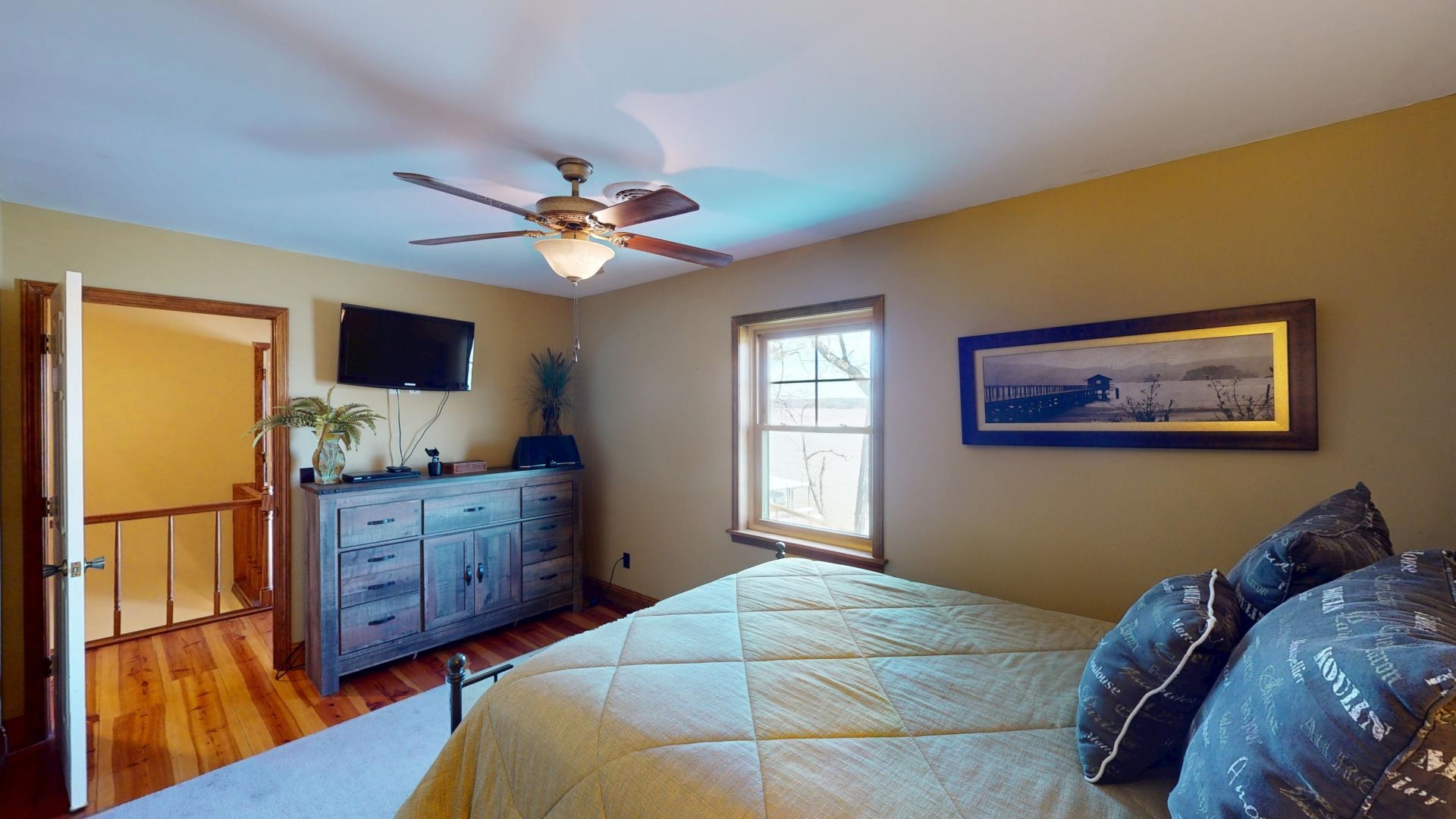 19 Beach Drive Iuka, MS 38852 - Photo 16 of 40 a bedroom with a bed dresser and a window