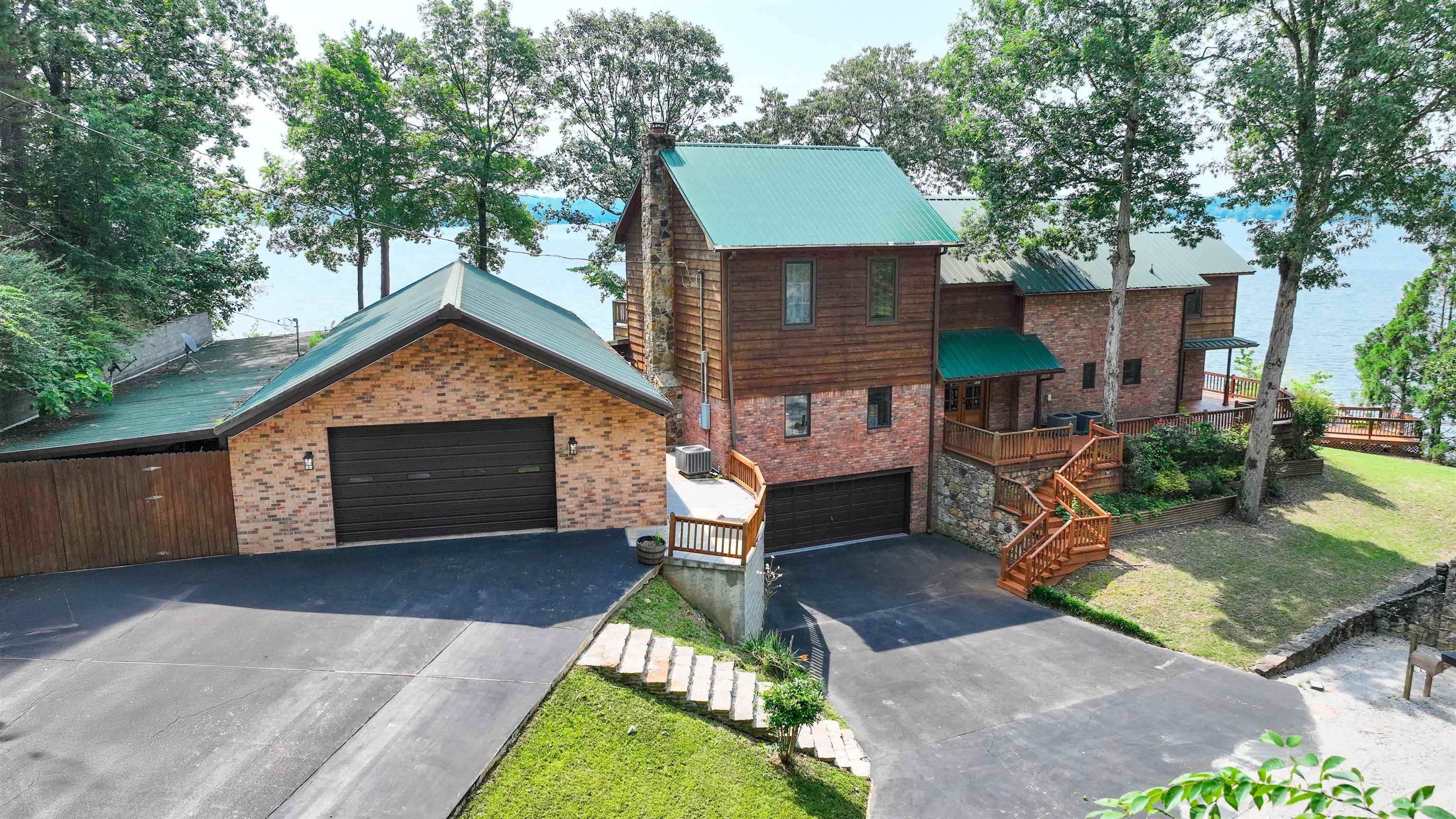 19 Beach Drive Iuka, MS 38852 - Photo 2 of 40 a front view of a house with a yard and outdoor seating