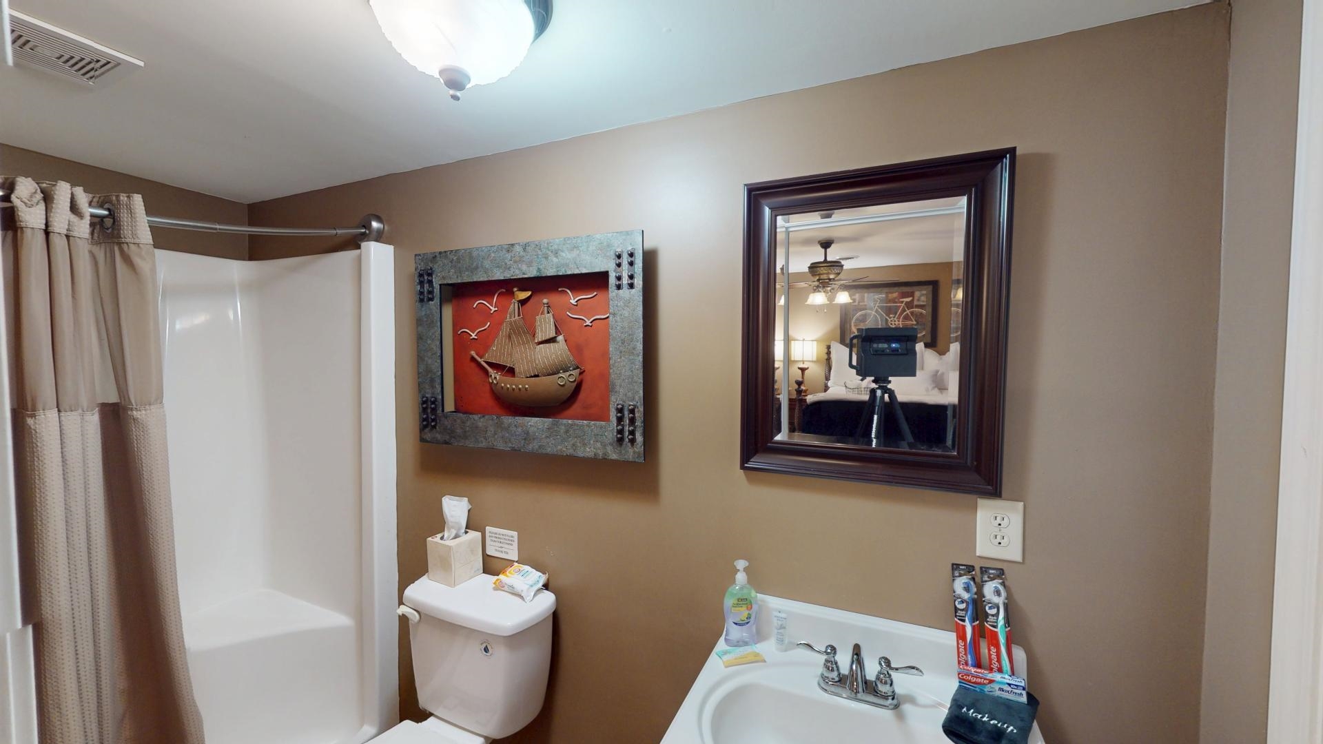 19 Beach Drive Iuka, MS 38852 - Photo 33 of 40 a bathroom with a toilet sink and mirror