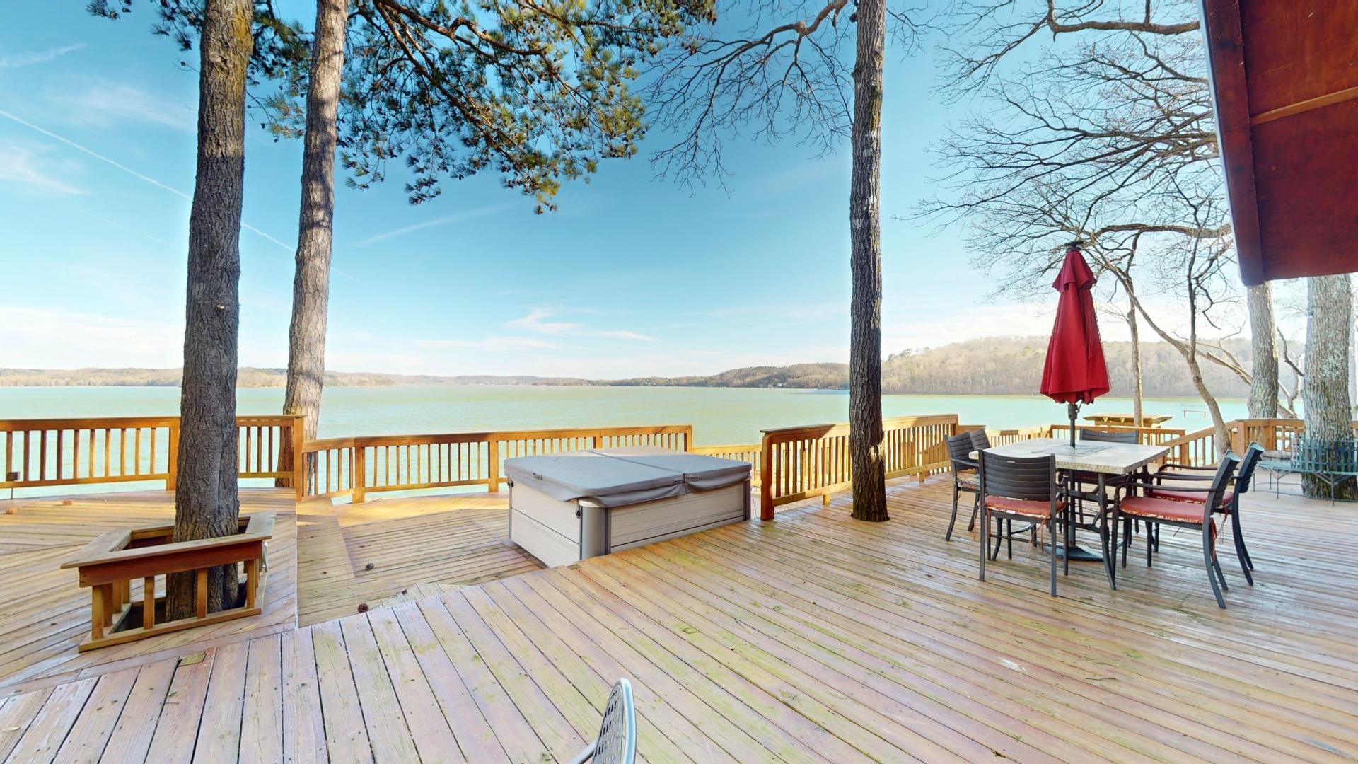 19 Beach Drive Iuka, MS 38852 - Photo 37 of 40 an outdoor sitting area with couch and wooden floor