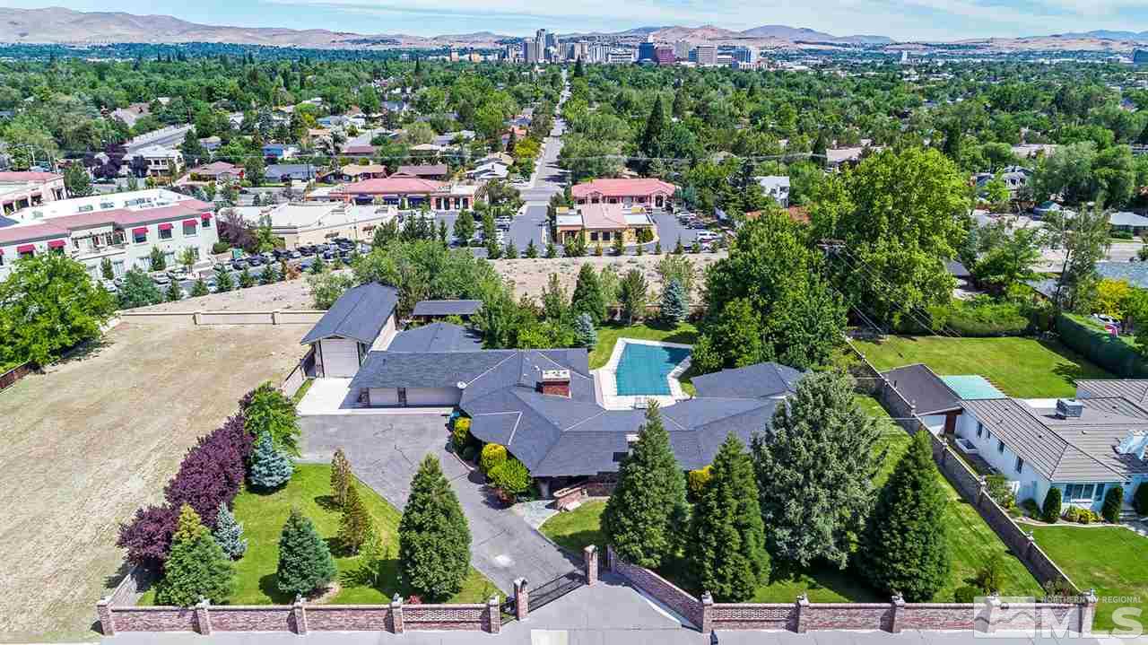 375 Chevy Chase Street Reno, NV 89509 - Photo 1 of 25 an aerial view of a houses with a yard