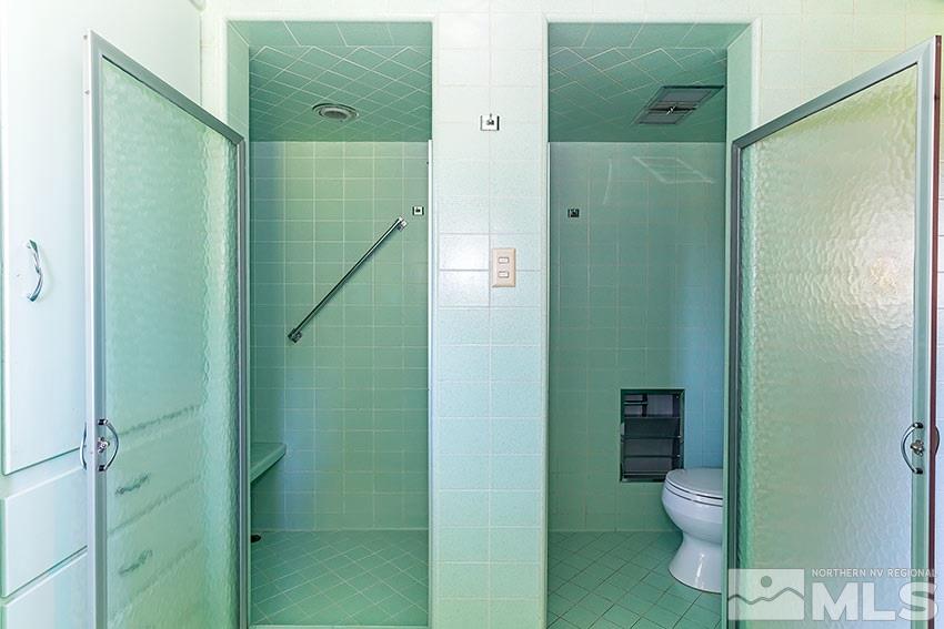 375 Chevy Chase Street Reno, NV 89509 - Photo 19 of 25 a bathroom with a toilet and a shower