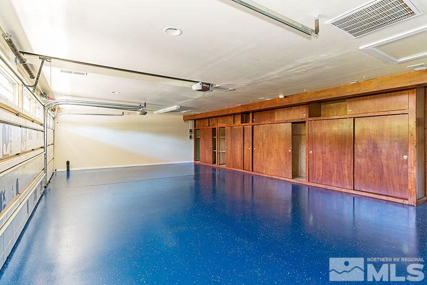 375 Chevy Chase Street Reno, NV 89509 - Photo 21 of 25 a view of an empty room with wooden floor and stairs