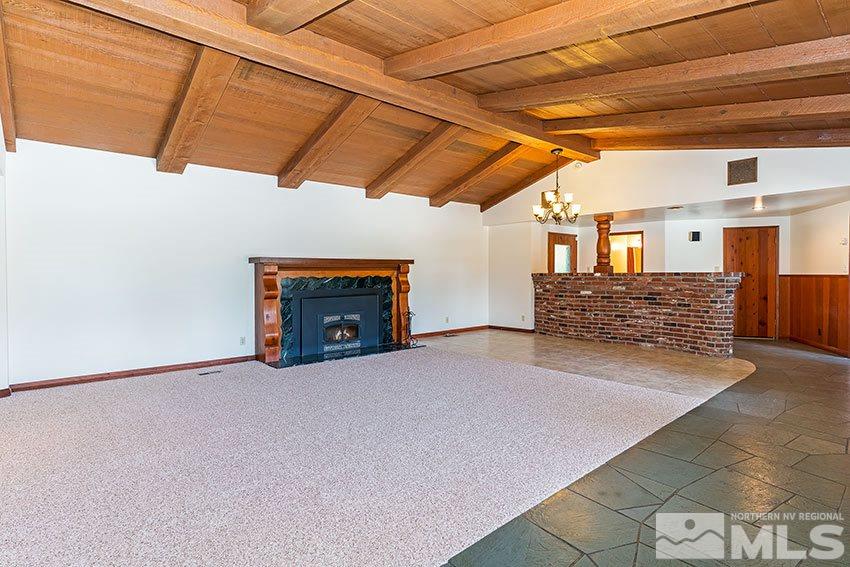 375 Chevy Chase Street Reno, NV 89509 - Photo 6 of 25 a view of an empty room with a fireplace