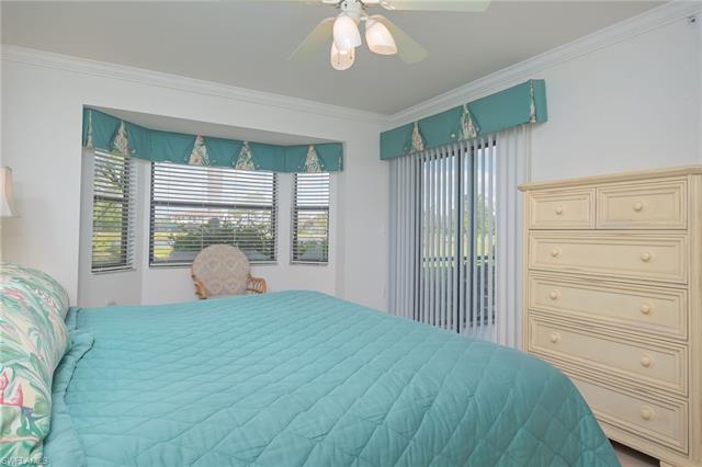 4120 Lorene Drive, Unit 101 Estero, FL 33928 - Photo 15 of 45 a bedroom with a bed and a window