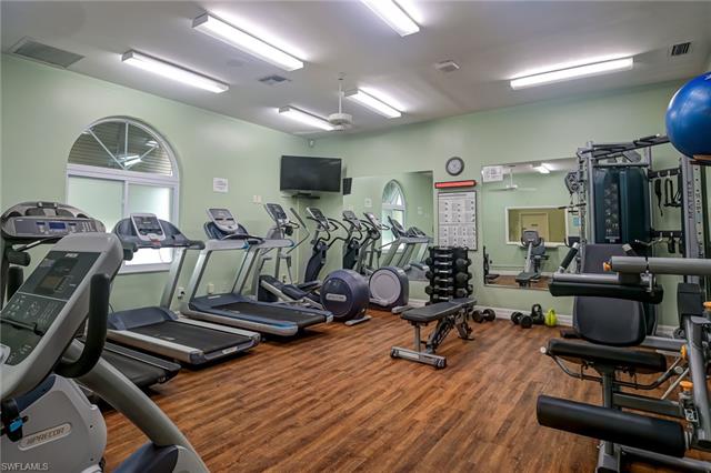 4120 Lorene Drive, Unit 101 Estero, FL 33928 - Photo 36 of 45 a view of a room with gym equipment