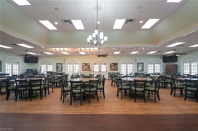 4120 Lorene Drive, Unit 101 Estero, FL 33928 - Photo 40 of 45 a view of a dining area with furniture