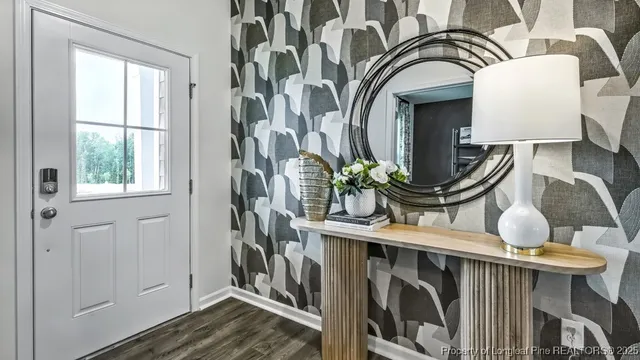 a view of entryway with wooden floor