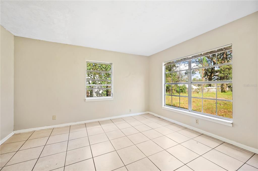 3221 Crutchfield Road Lakeland, FL 33805 - Photo 18 of 49 a view of an empty room with a window