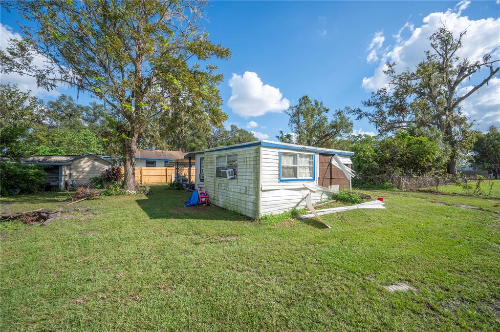 3221 Crutchfield Road Lakeland, FL 33805 - Photo 26 of 49 a view of a house with backyard