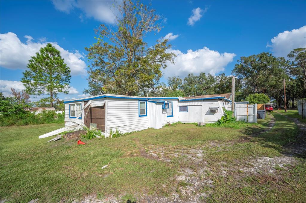 3221 Crutchfield Road Lakeland, FL 33805 - Photo 27 of 49 front view of a house with a yard