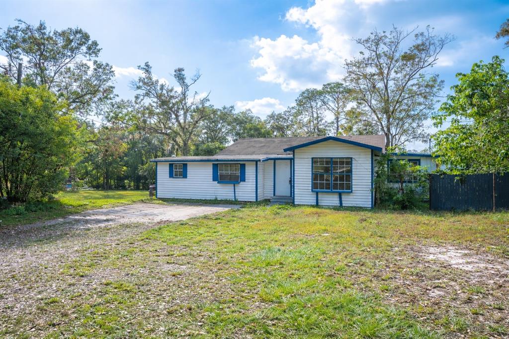 3221 Crutchfield Road Lakeland, FL 33805 - Photo 32 of 49 a house with trees in the background