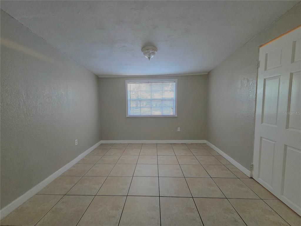 3221 Crutchfield Road Lakeland, FL 33805 - Photo 40 of 49 an empty room with windows