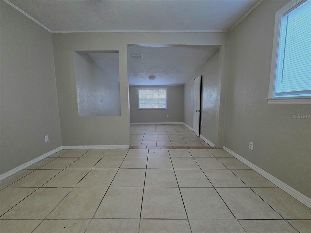 3221 Crutchfield Road Lakeland, FL 33805 - Photo 44 of 49 a view of an empty room with a window