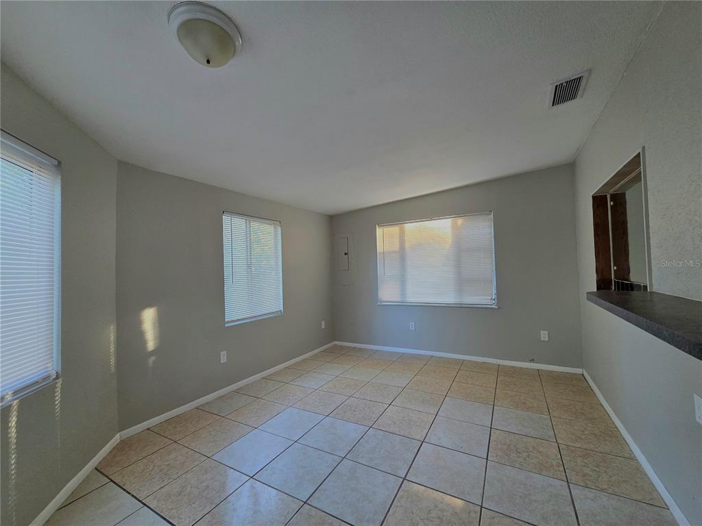3221 Crutchfield Road Lakeland, FL 33805 - Photo 46 of 49 a view of an empty room with a window
