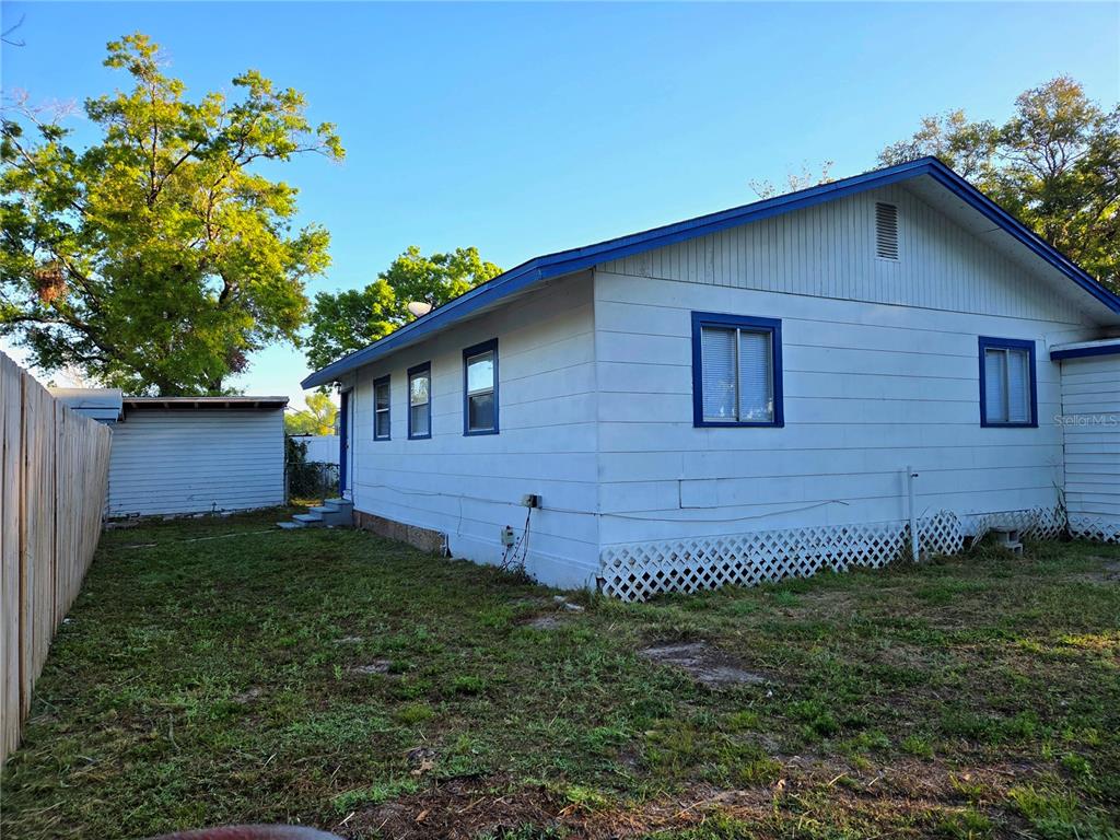 3221 Crutchfield Road Lakeland, FL 33805 - Photo 47 of 49 a view of a house with a yard