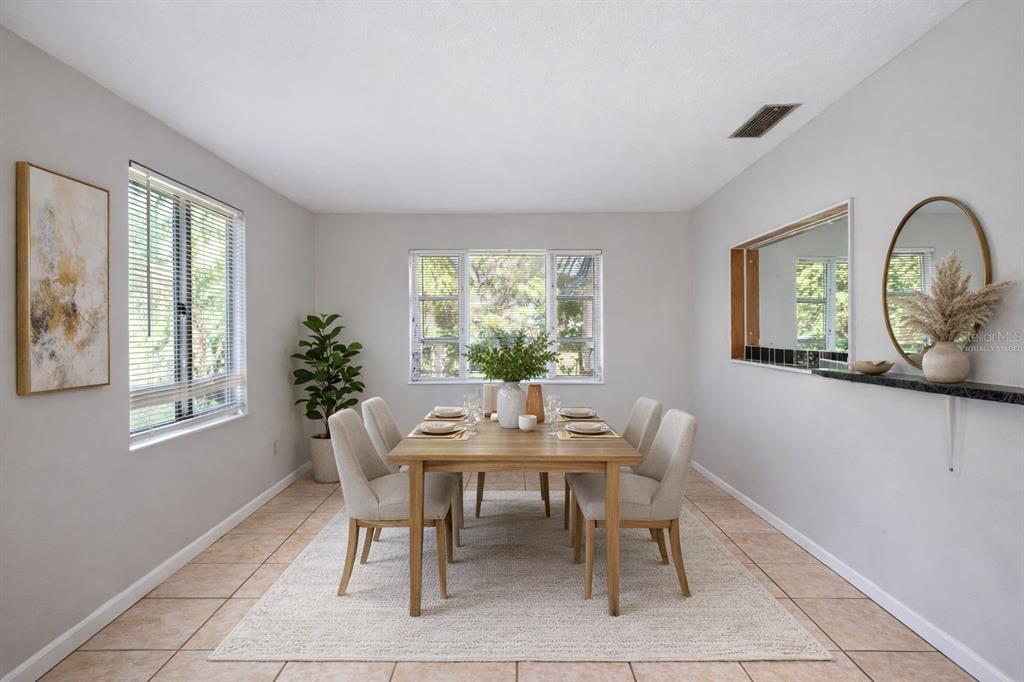 3221 Crutchfield Road Lakeland, FL 33805 - Photo 5 of 49 a view of a dining room with furniture window and outside view