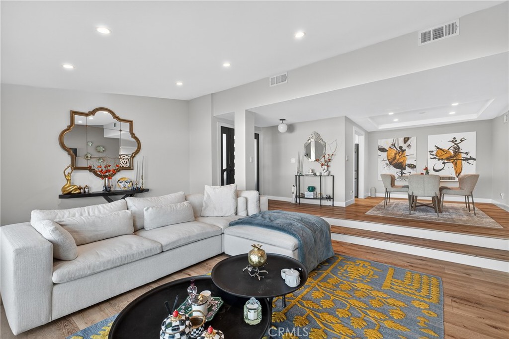 5 Cypress Way Rolling Hills Estates, CA 90274 - Photo 20 of 45 a living room with furniture and a chandelier