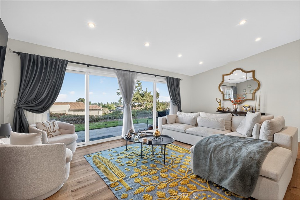 5 Cypress Way Rolling Hills Estates, CA 90274 - Photo 3 of 45 a living room with furniture and a floor to ceiling window