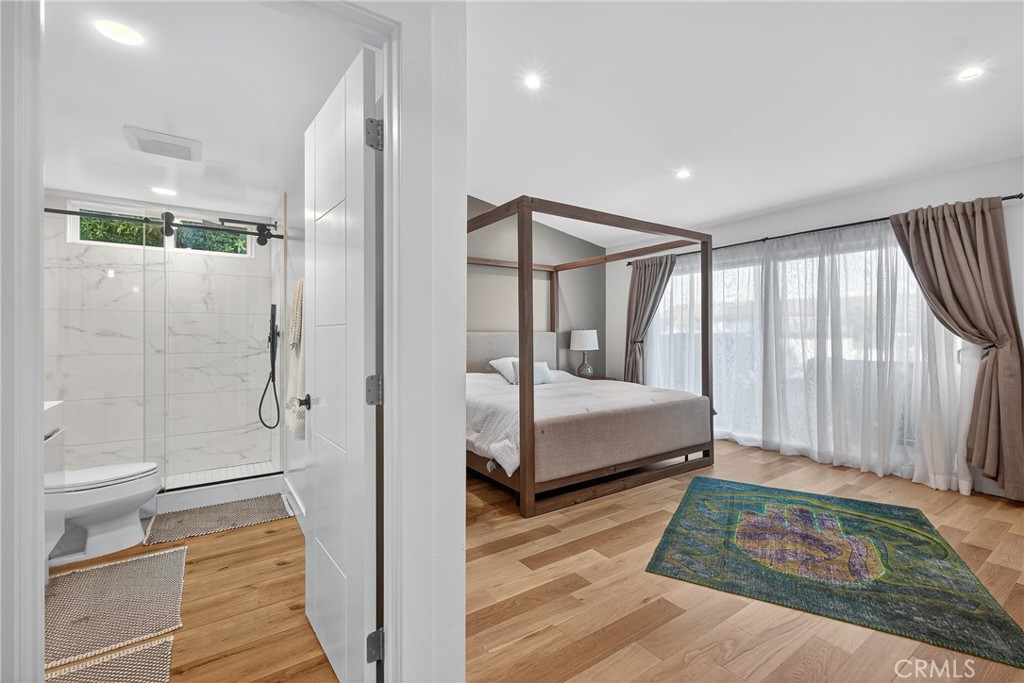 5 Cypress Way Rolling Hills Estates, CA 90274 - Photo 32 of 45 a bathroom with a glass shower door and a bathtub