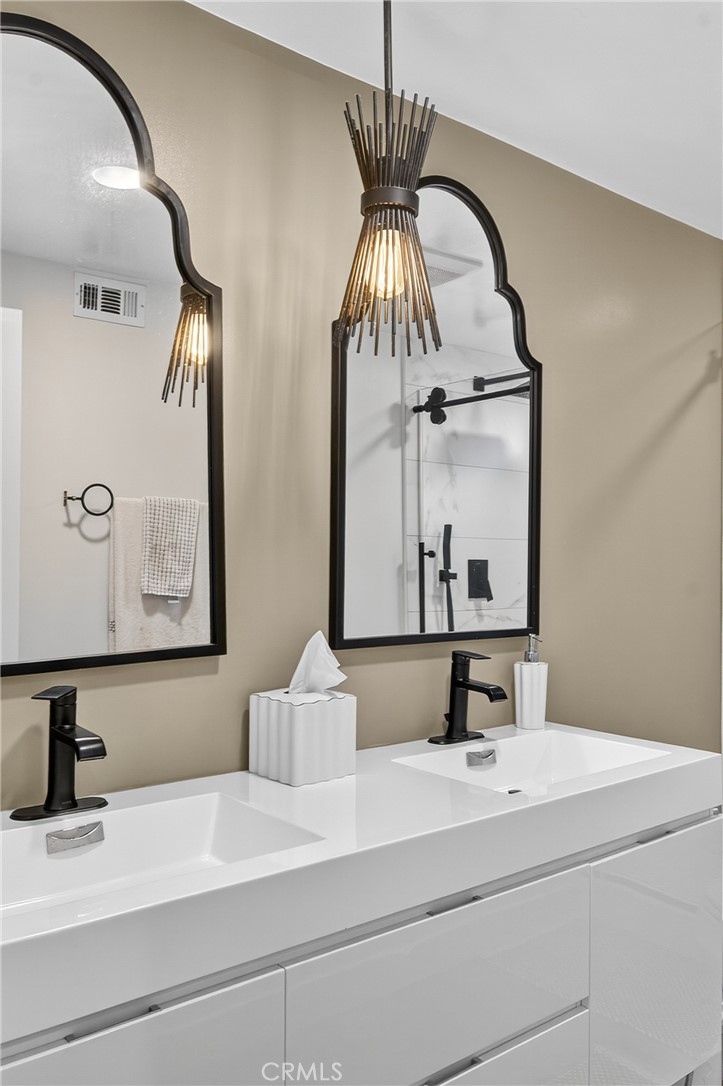 5 Cypress Way Rolling Hills Estates, CA 90274 - Photo 34 of 45 a bathroom with a sink and a mirror