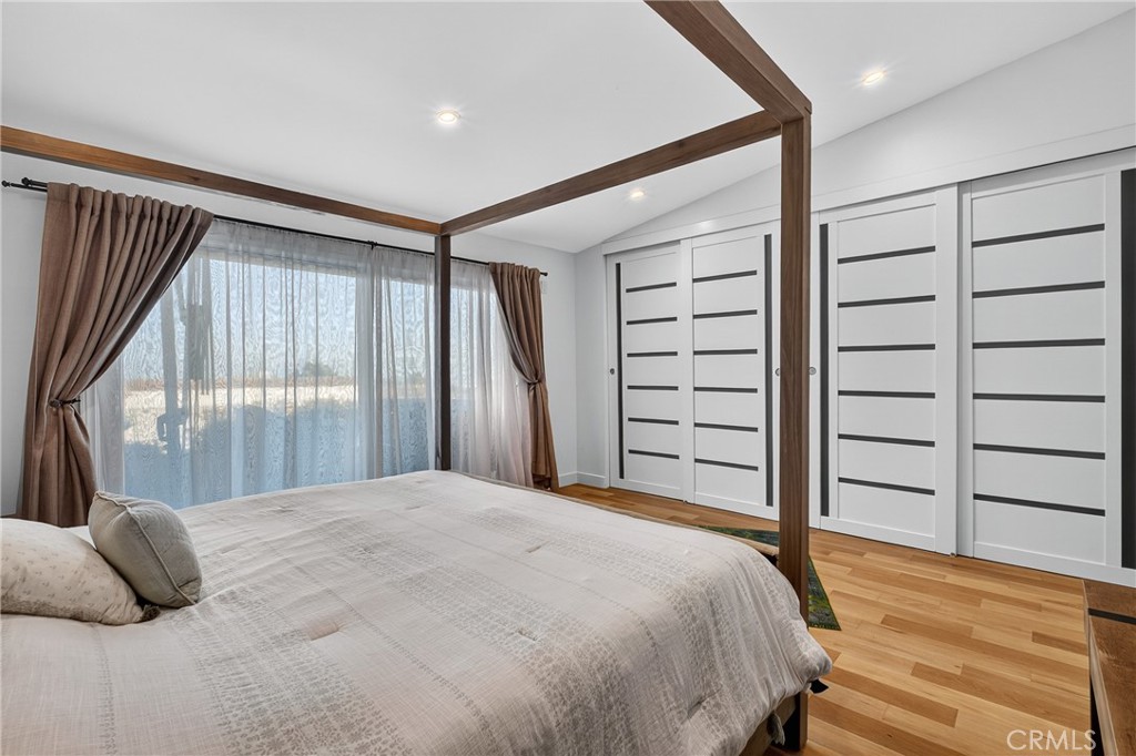 5 Cypress Way Rolling Hills Estates, CA 90274 - Photo 36 of 45 a bedroom with a large bed and a large window