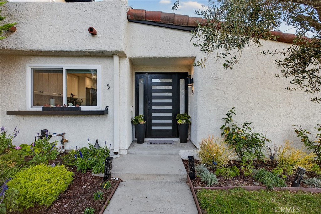 5 Cypress Way Rolling Hills Estates, CA 90274 - Photo 38 of 45 a front view of a house with garden