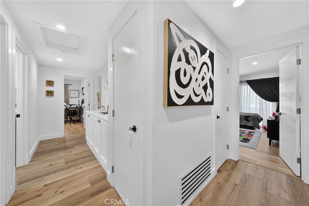 5 Cypress Way Rolling Hills Estates, CA 90274 - Photo 6 of 45 a view of a hallway with wooden floor and closet