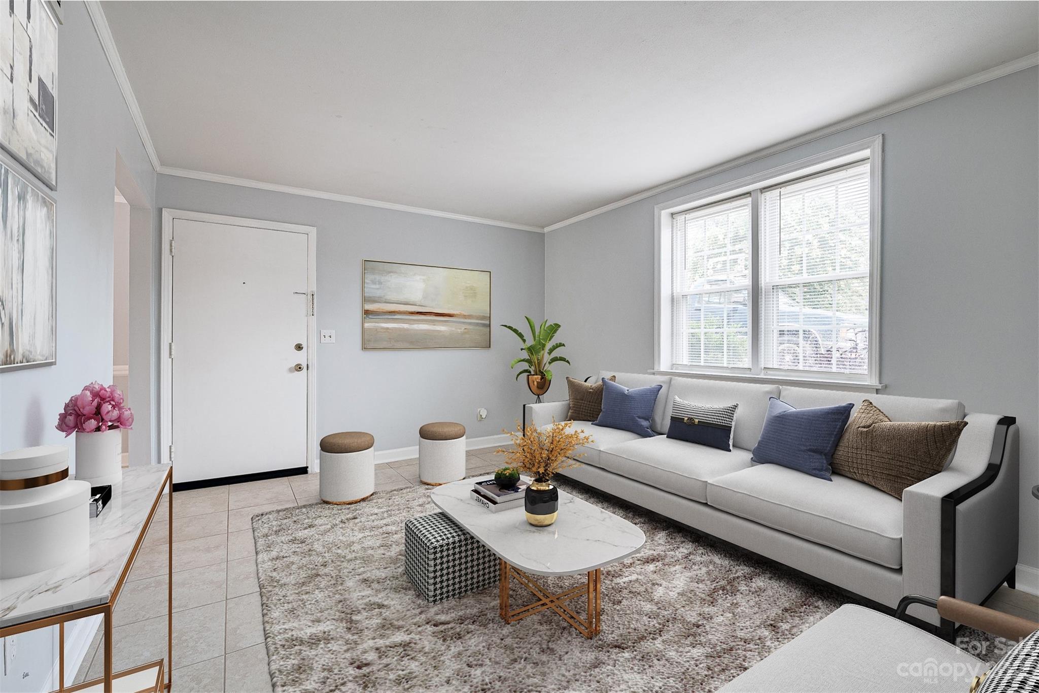 a living room with furniture and a window